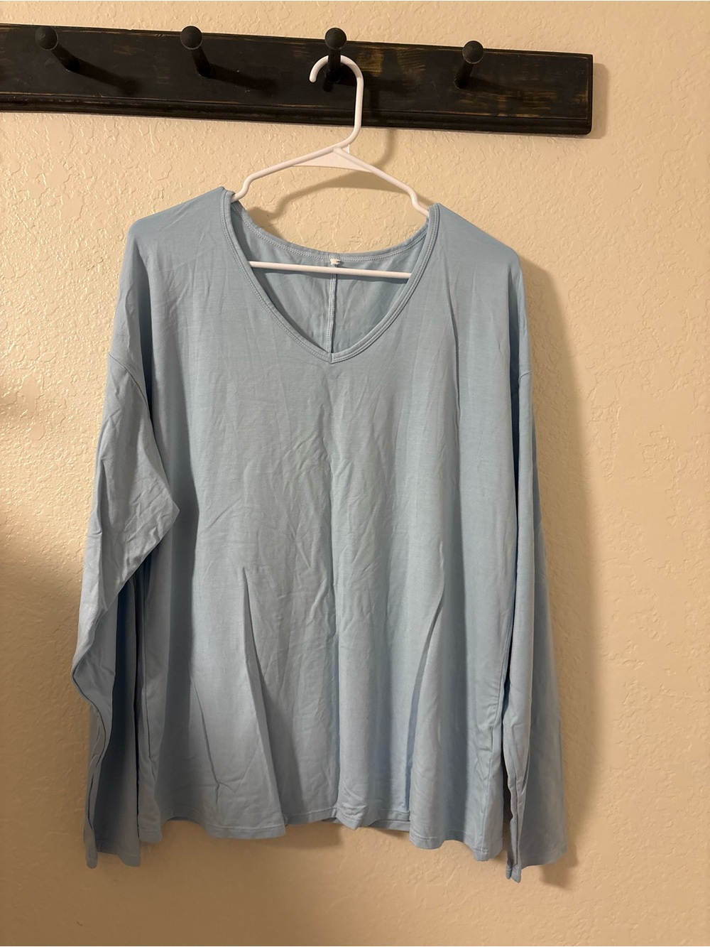 Halara NWOT, size L .  Light Blue V-Neck Long Sleeve Top very soft